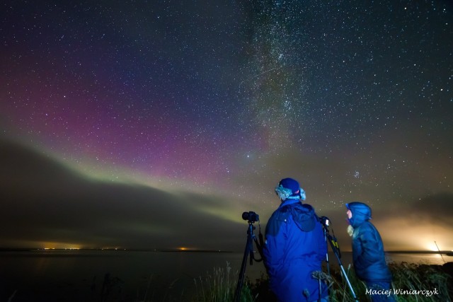 Gordon and me trying to photograph the aurora as the clouds came in. The stars were beautiful. Photo by Maciej Winiarczyk.