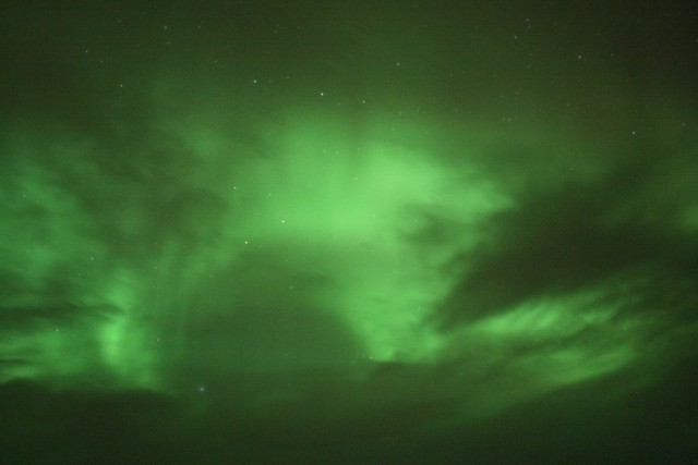 Green skies at night... aurora chasers' delight.