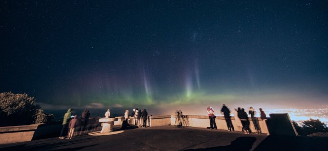 Students watching the aurora at Signal Hill, Dunedin, New Zealand.