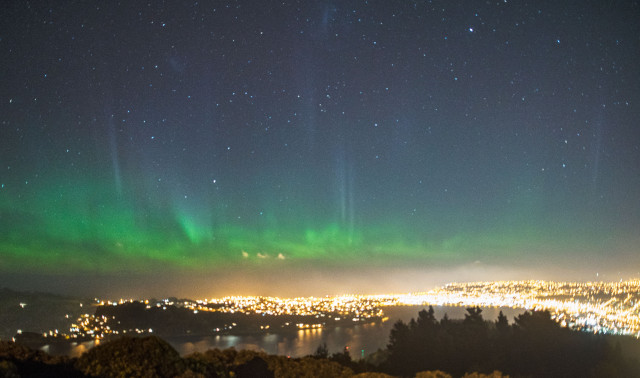 The southern lights dancing above Dunedin, New Zealand.