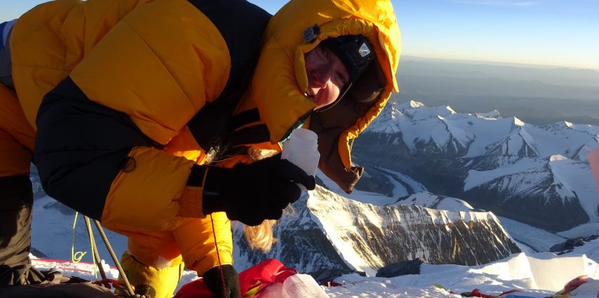 Melanie takes a snow sample on the summit of Everest